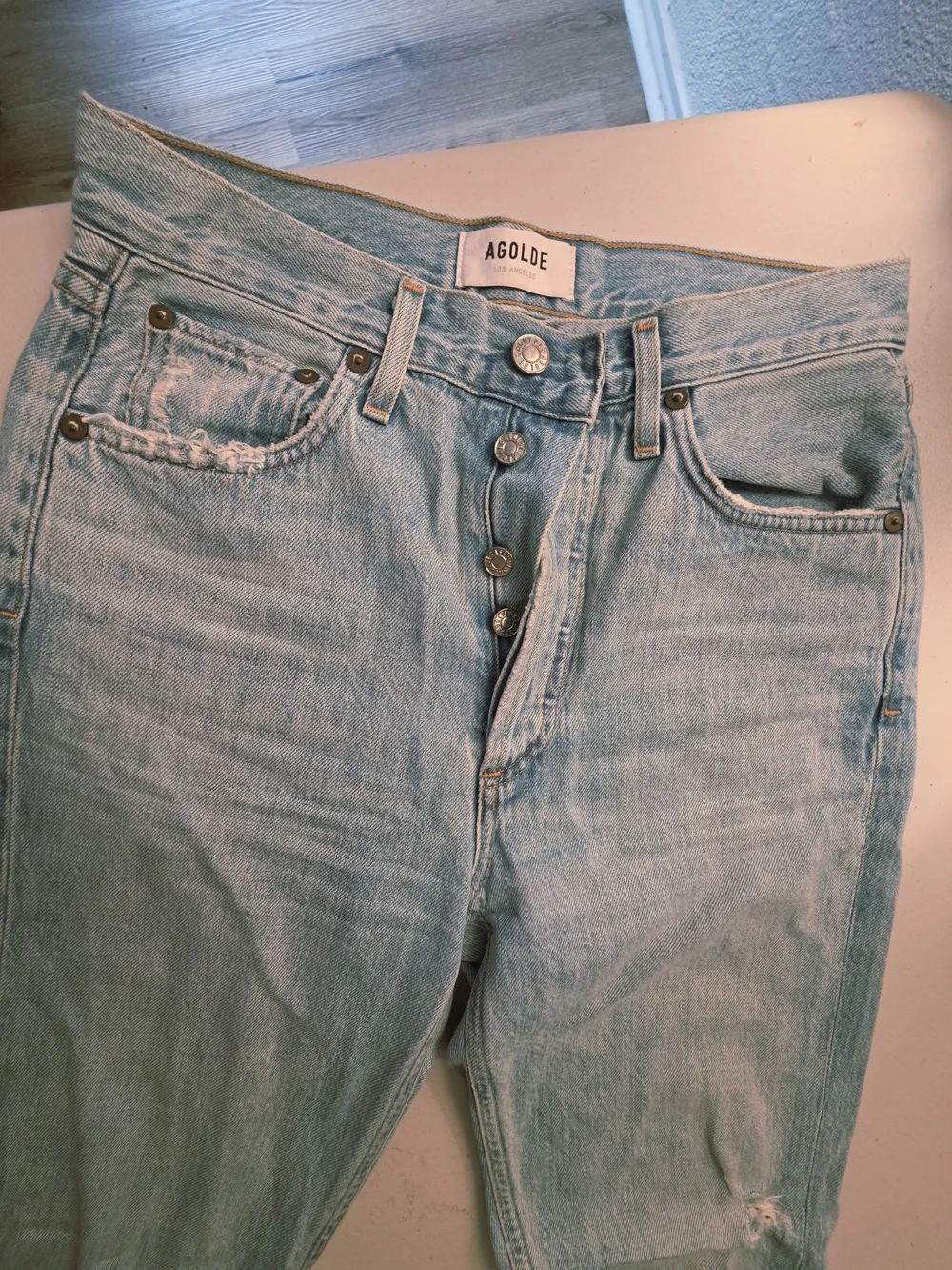 AGOLDE Light Blue High-Rise Straight-Leg Jeans with Knee Distress